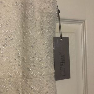 White, shimmery silver cocktail dress.